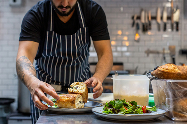 chef preparing food like bread